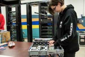 computer network student putting together a computer